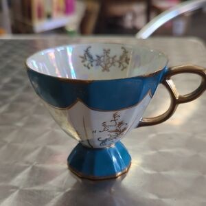 Elegant Blue and Gold Teacup